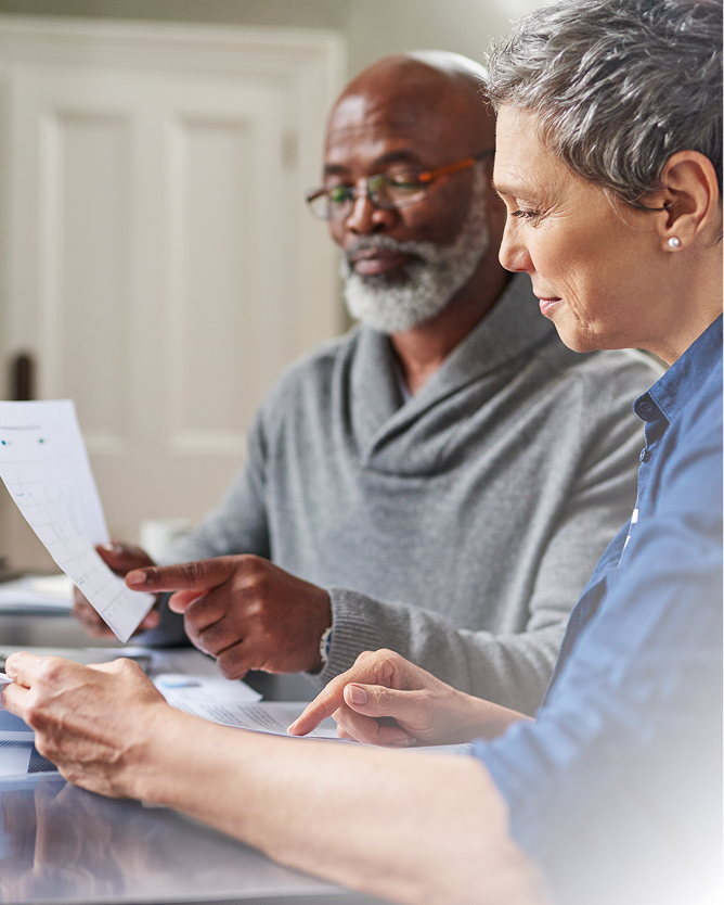 Precision Financial Planning advisors meeting with clients